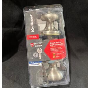 Kwikset Cove Satin Nickel Keyed Entry Door Knob featuring SmartKey Security